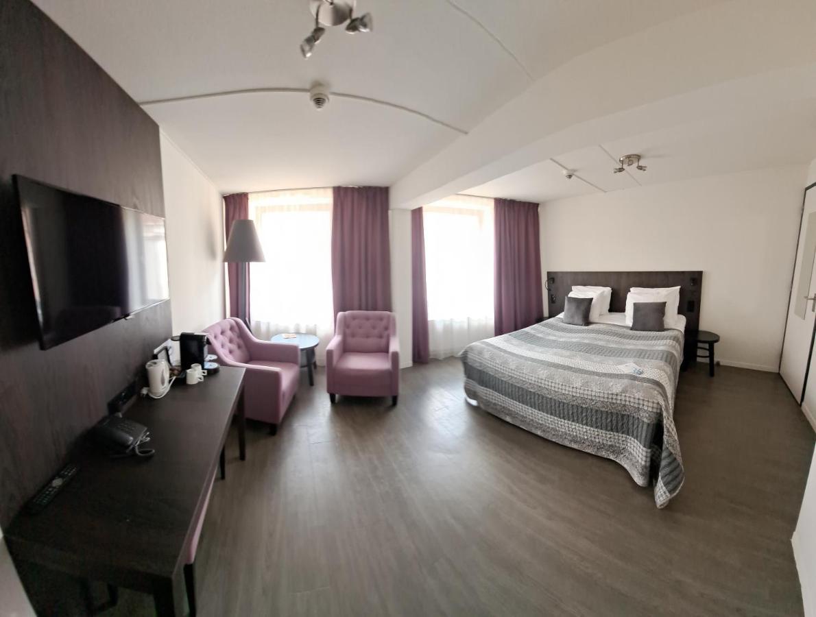 Hampshire Hotel - 'S Gravenhof ซุทเฟน ภายนอก รูปภาพ